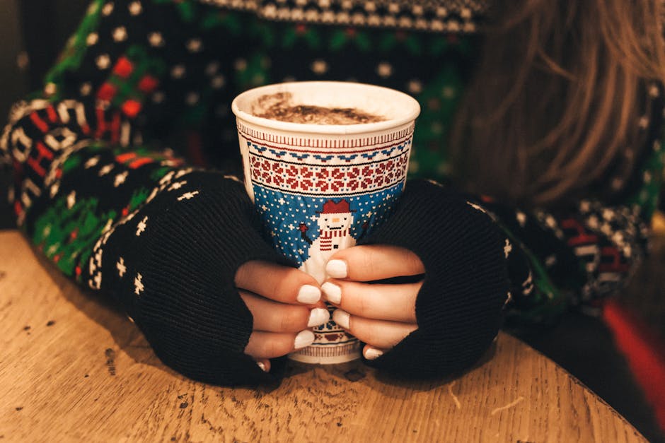 Close-up of Hand Holding Cup